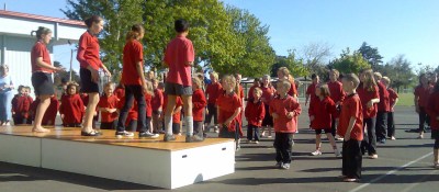 doing Jump Jam at school in the sunshine