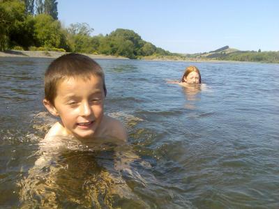 Sarah and Lachlan cool off in the Tukituki River