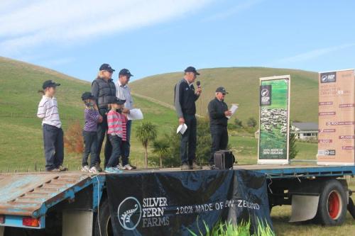 The Ritchie family on the left with Silver Fern Farms director Angus Mabin speaking and field day facilitator Roy Fraser on the right